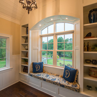 Inspiration for a mid-sized eclectic wood u-shaped staircase in Charlotte with painted wood risers.