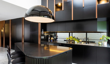 Room of the Week: A Black & Dramatic Kitchen with a Joinery Wall