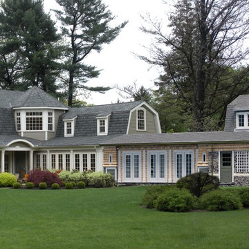 New carriage house, loft, gallery and secret garden addition to 1980's home.
