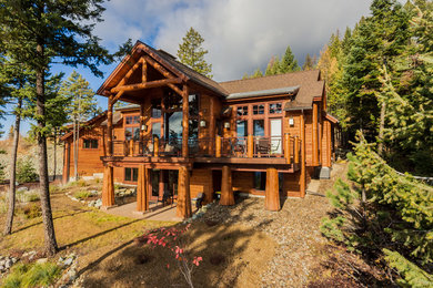Rustic exterior home idea in Other