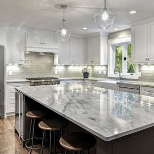White cabinets and grey countertops