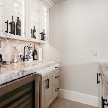 Custom Wet Bar with Stone Slab Counter & Full-Height Slab Backsplash – Newport C