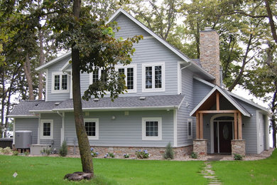 Example of a mid-sized beach style exterior home design in Other