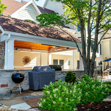 Pool Side Covered Patio with Fireplace and Bar Area