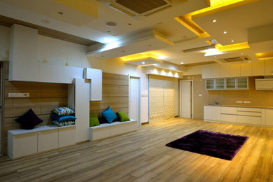 Example of a trendy family room design in Chennai