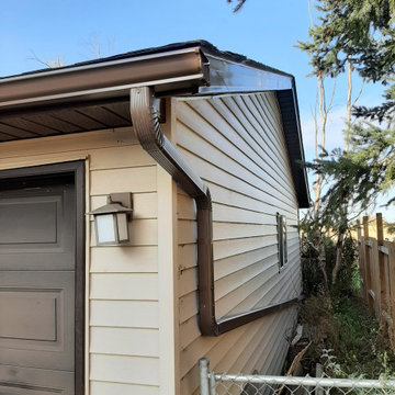 Living room, gutters and downspouts