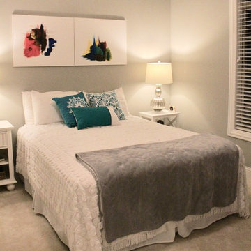 Pops of color in a white guest room