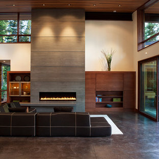 Exempel på ett modernt vardagsrum, med betonggolv