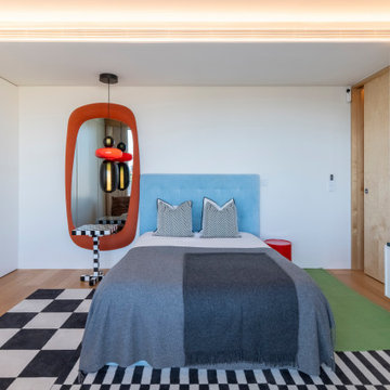 Bedroom with Blue Headboard and Orange Mirror, Lisbon