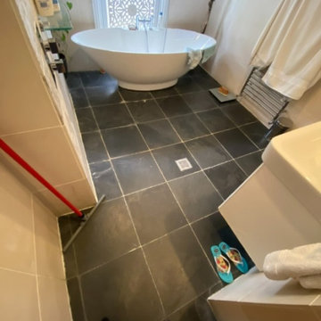 Black Slate Tiled Bathroom Floor Transformed in Brixton