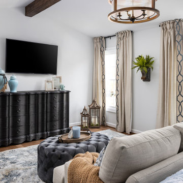 Bedroom with Charcoal Vaulted Board & Batten Accent Wall