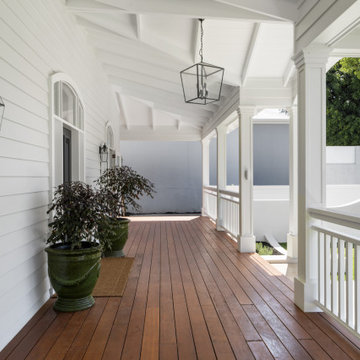 Elegant entrance and porch with exquisite timber details