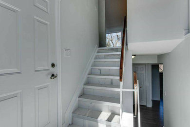 Inspiration for a modern staircase remodel in Edmonton