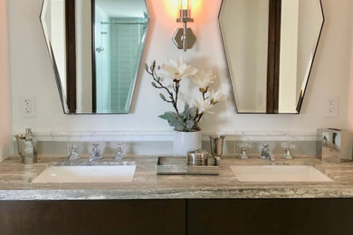 Example of a small beach style gray tile and ceramic tile double-sink bathroom design in Los Angeles with limestone countertops, gray countertops and a built-in vanity