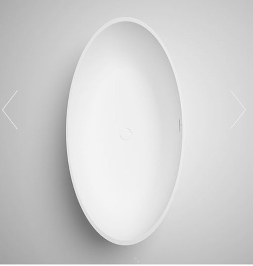 Solid surface vs. acrylic tub? Help!