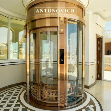 Statement Vertical Design | Circular Elevator & Staircase by Antonovich Group