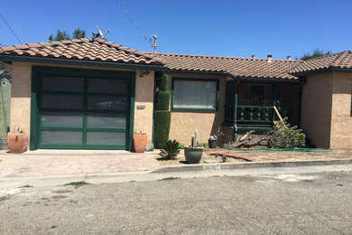 Oakland Hills Mediterranean Home with Custom Color & Glass Garage Door
