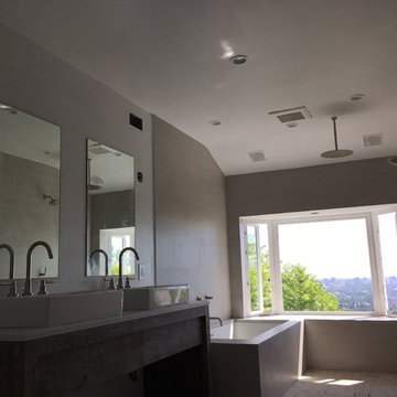Full Bathroom Panorama With Vanity, Tub and City View