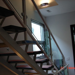 Steel stairs with glass panel - Products
