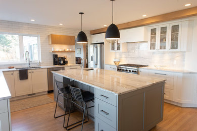 Example of a transitional kitchen design in Vancouver