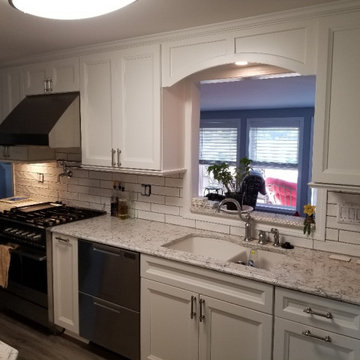 Traditional, white recessed panel kitchen