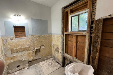 Example of a mid-century modern bathroom design in Other