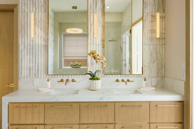 Corner shower - large transitional master marble tile porcelain tile and double-sink corner shower idea in Dallas with flat-panel cabinets, a bidet, an undermount sink, marble countertops, a hinged shower door, white countertops and a floating vanity