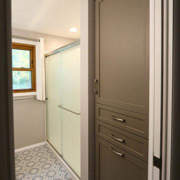 Master Bathroom with Frappe Gray Vanity, Closet Storage and Shower Enclosure