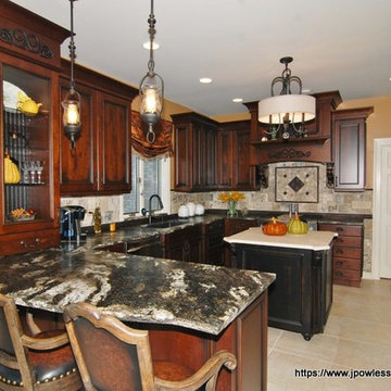 Kitchen Knotty cherry with black wrought iron accents