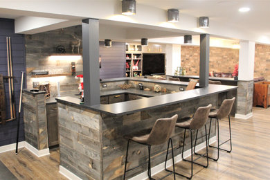 Inspiration for a large transitional underground shiplap wall basement remodel in DC Metro with a bar