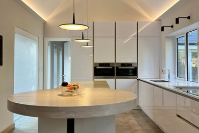 Kitchen - contemporary kitchen idea in Surrey