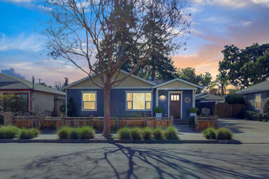 Small arts and crafts blue one-story concrete exterior home photo in San Francisco with a shingle roof