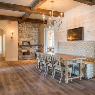 Photo of a large traditional open plan dining in Miami with brown walls, medium hardwood floors, no fireplace and brown floor.
