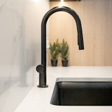 Sophisticated matte black and warm rift cut oak collision