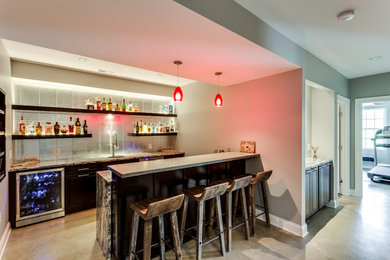 Photo of a modern seated home bar in Baltimore.