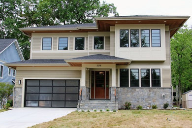 This is an example of a transitional two-storey exterior in DC Metro with stone veneer.