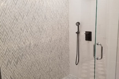 Bathroom - mid-sized modern master black tile and ceramic tile cement tile floor and black floor bathroom idea in Orange County with shaker cabinets, gray cabinets, a one-piece toilet, white walls, an undermount sink, quartzite countertops and white countertops
