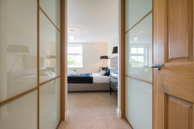 Design ideas for a contemporary bedroom in Hertfordshire.