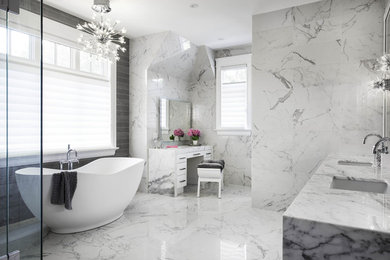 Inspiration for a transitional master bathroom in Toronto with an undermount sink, a freestanding tub and white tile.