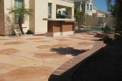 Patio kitchen - mid-sized traditional backyard patio kitchen idea in Phoenix with a roof extension