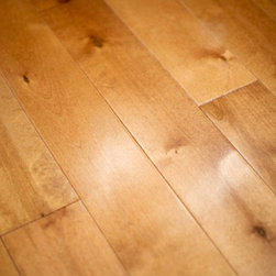 Hardwood flooring is 3 1/2" Solid Birch - Hardwood Flooring