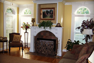 Family room - french country family room idea in Nashville