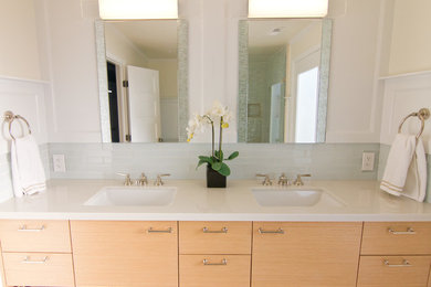 Large transitional master blue tile and glass tile porcelain tile corner shower photo in Denver with an undermount sink, flat-panel cabinets, light wood cabinets, marble countertops, a two-piece toilet and white walls