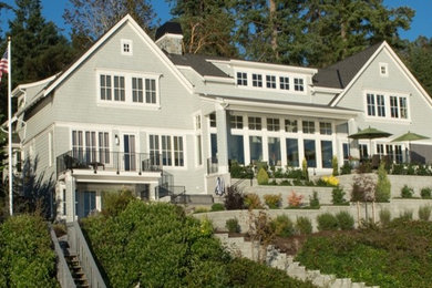 Inspiration for a large timeless three-story exterior home remodel in Seattle
