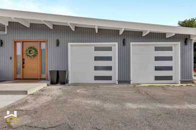 Garage - huge modern attached two-car garage idea in San Francisco