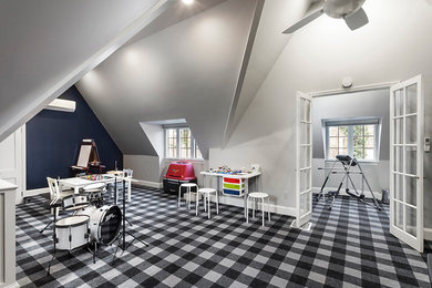 Example of a large transitional boy carpeted and blue floor kids' room design in Detroit with blue walls
