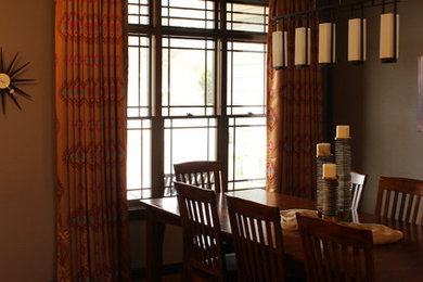 Great room - mid-sized contemporary dark wood floor great room idea in Other with brown walls