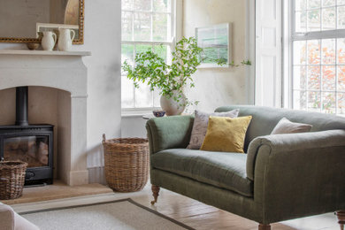 Inspiration for a country living room in Hampshire with carpet.