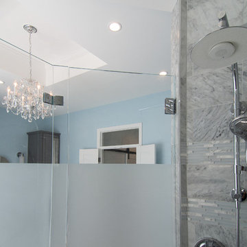 His and her master suite in a deep gray painted finish complete with french door