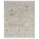 Nourison - Nourison Traditional Home 8'6" x 11'4" Light Blue Vintage Indoor Area Rug - Set the tone for rest and relaxation with this vintage-inspired blue rug from the Traditional Home Collection. Classic Persian motifs are reinvented with transitional styling, then finished with short fringe edges. The machine-made polypropylene construction boasts performance and durability, resulting in a shed-free rug that cleans up easily with regular vacuuming and spot cleaning with a damp washcloth.